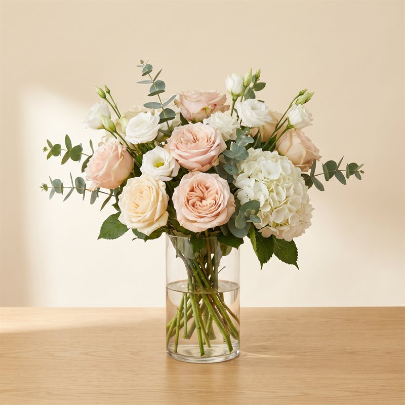 Soft designer's choice arrangement in blush and ivory